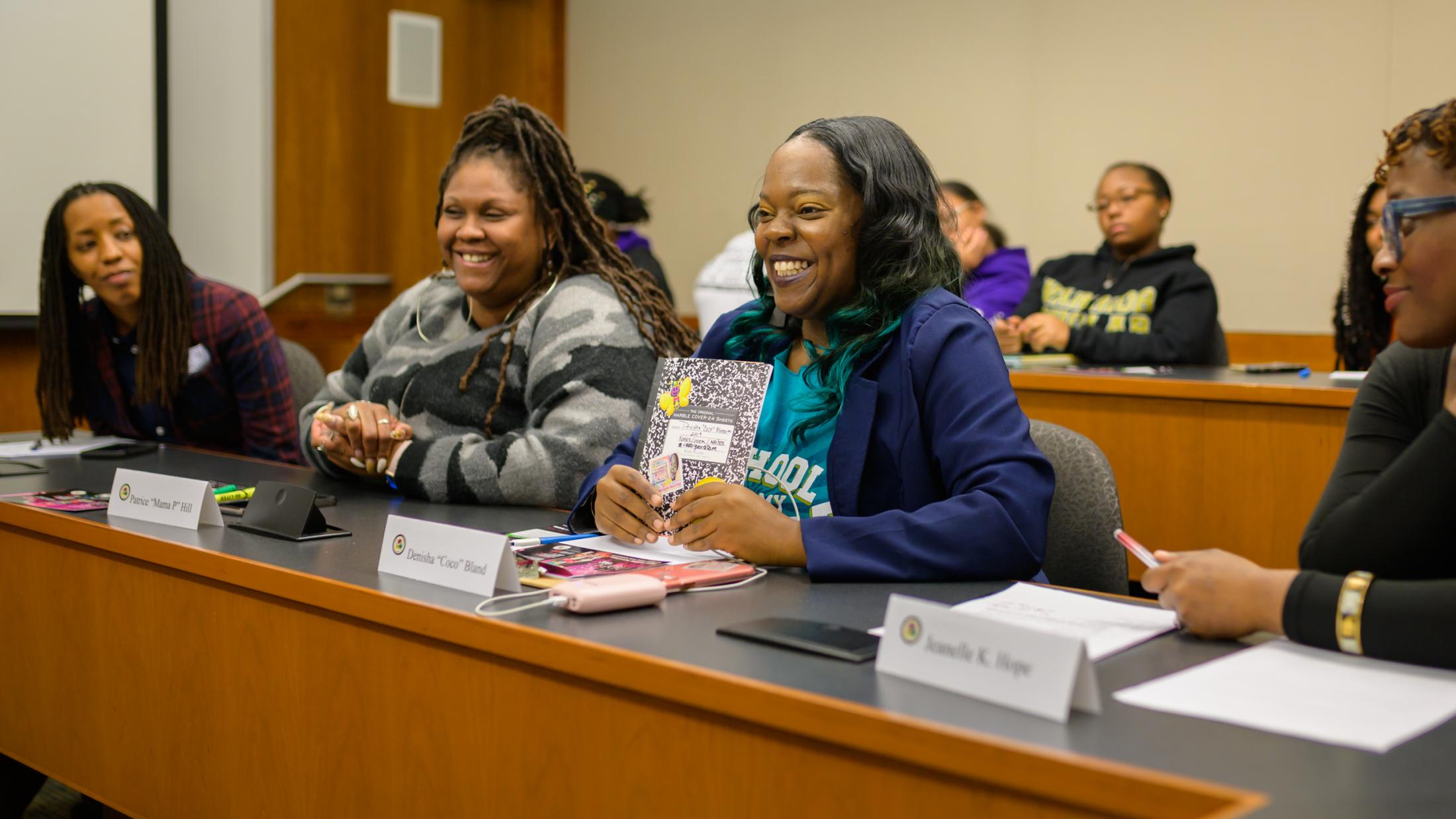 Denisha "Coco" Bland speaking on panel