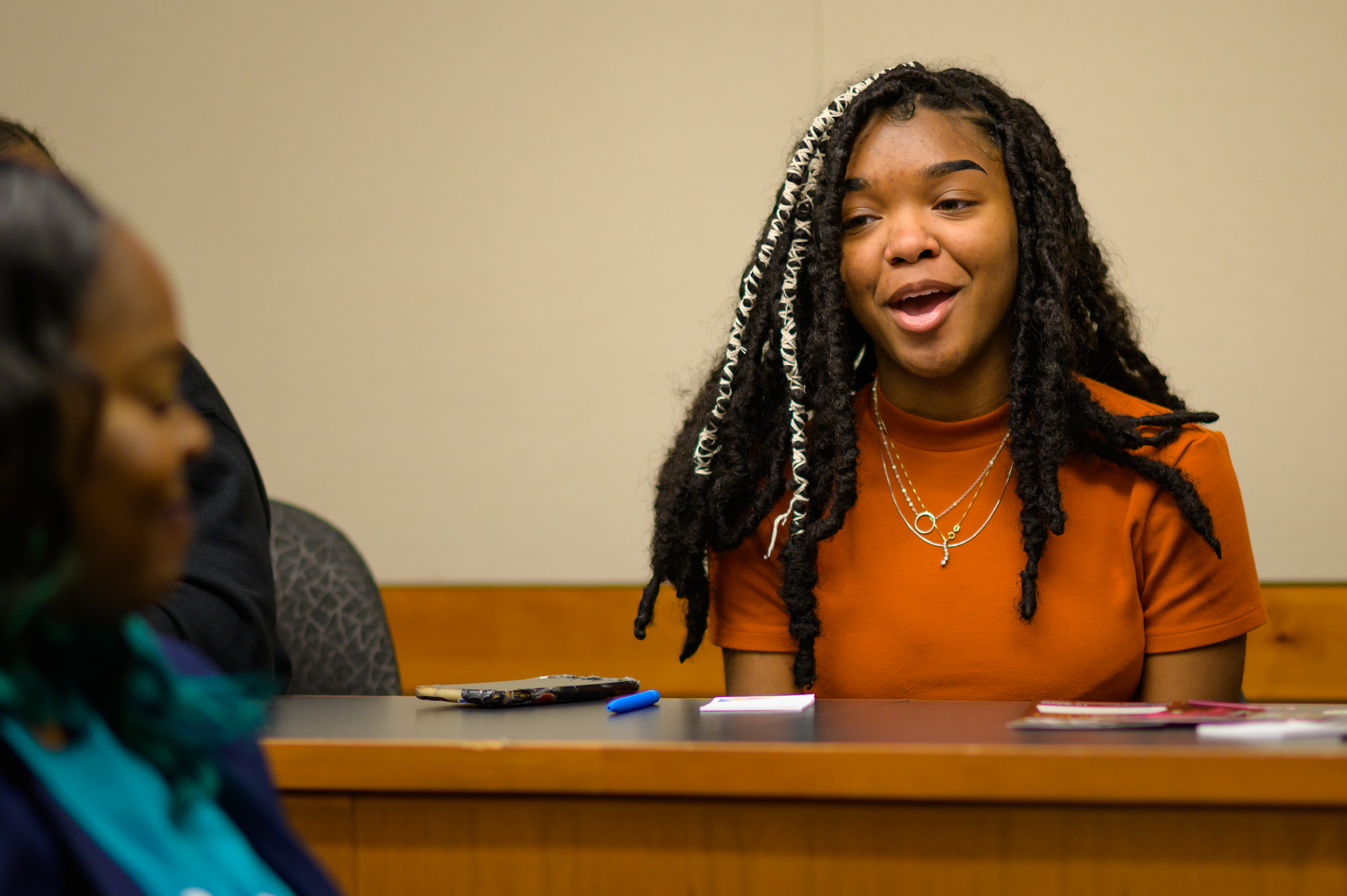 Medium close up of Alanayshia responding to panelists