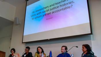 Wide view of panel as Sunaina Maira responds to question