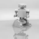 Small robot moves across a blank, glossy table. Black and white photograph.